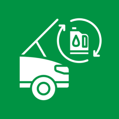 Car oil change symbol on green background.